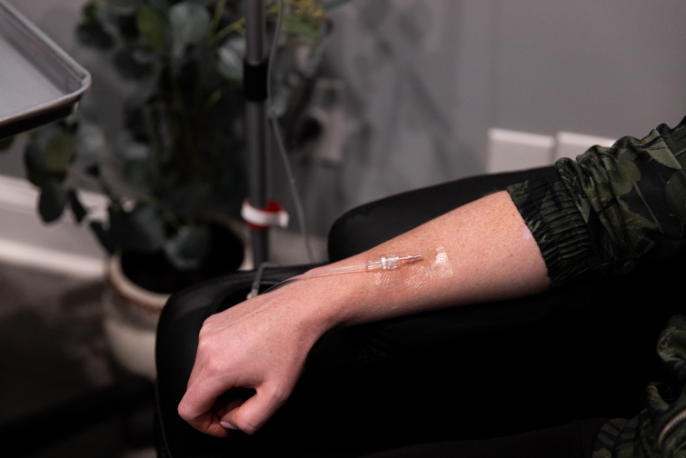 Patient receiving IV Therapy in her arm