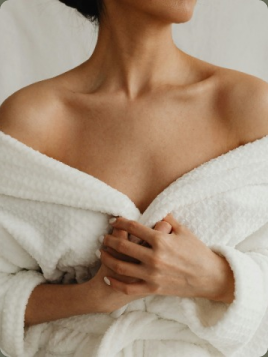 woman's silhouette in white bath robe